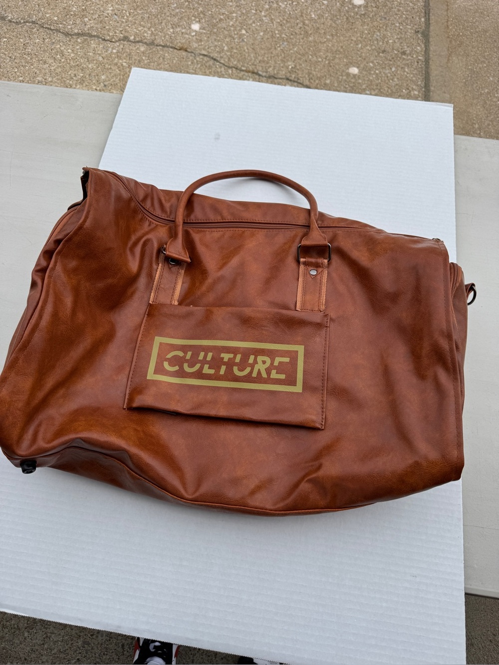 Culture Wardrobe Duffel. Shoulder strap and carry handles. NEW
